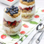 A spoon with the breakfast dish next to it.